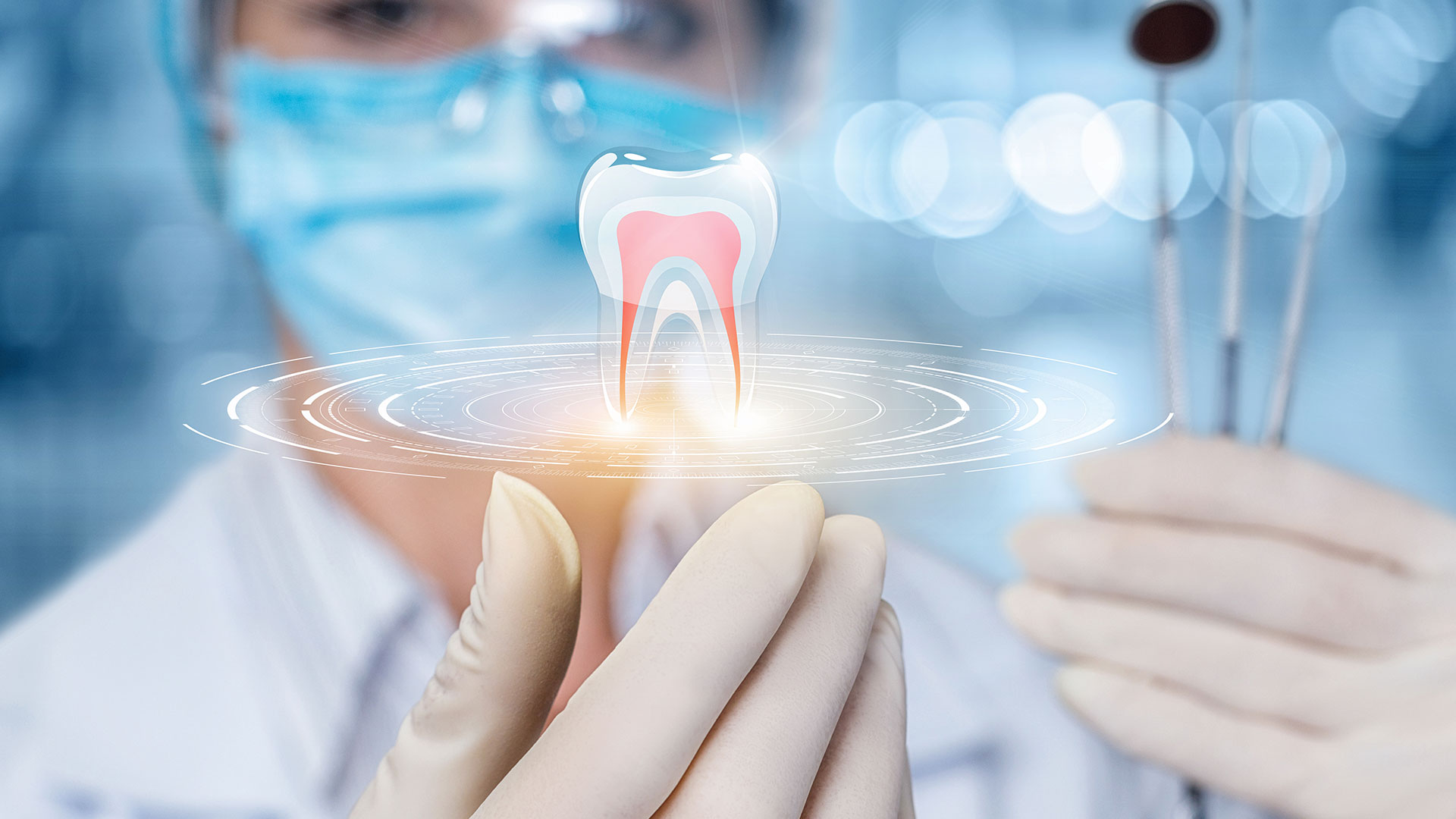 Dentist reviewing a root canal treatment illustration in Bonita Springs