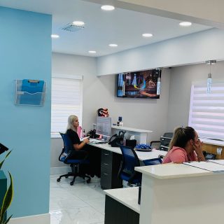 Dental Blush team providing emergency dental treatment