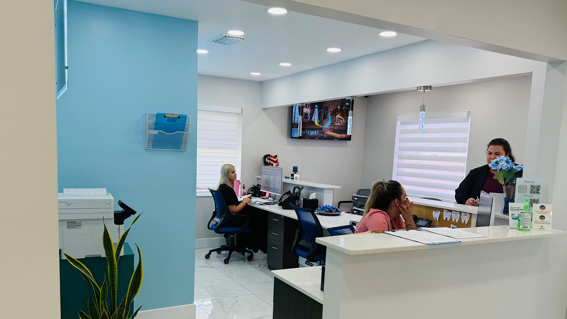 Dental Blush Cape Coral team providing emergency dental treatment