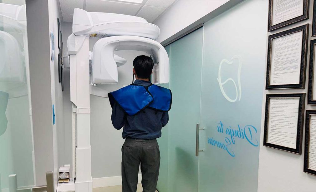 Patient receiving CBCT 3D dental imaging at Dental Blush in Miami