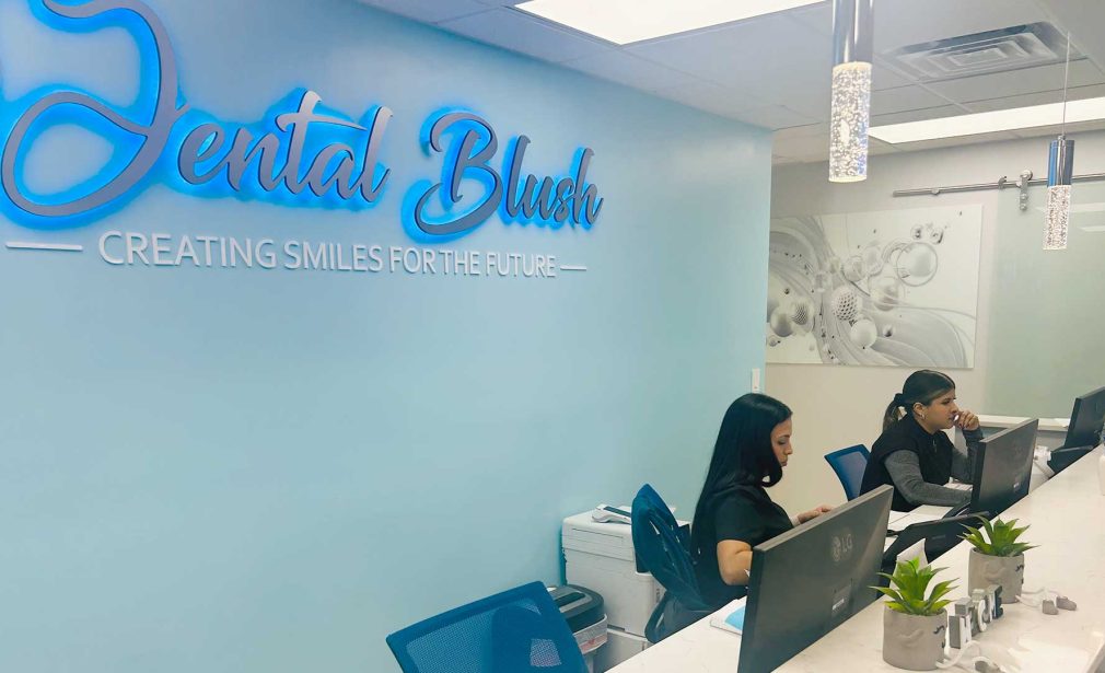 Dental Smile Design in Miami with Dental Blush Tamiami front desk team assisting patients
