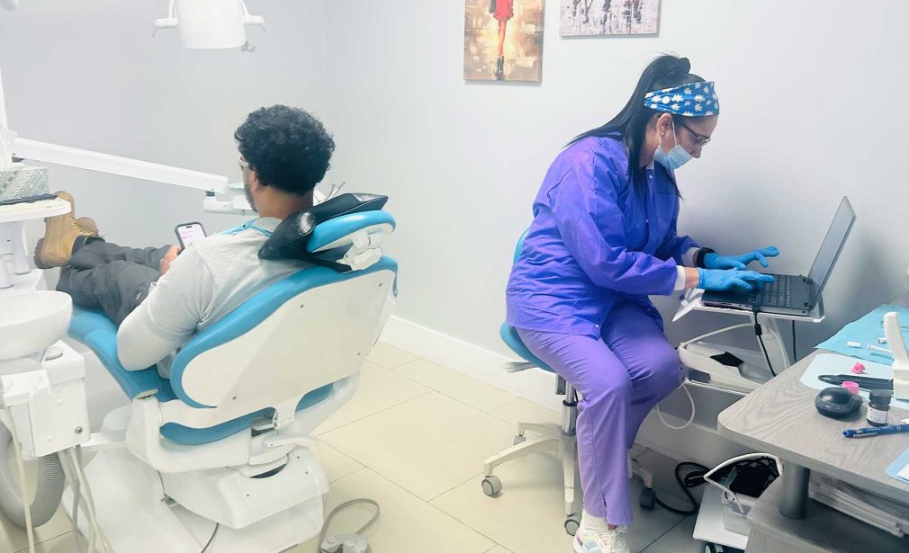 Dentures in Miami FL with dental team preparing patient care at Dental Blush Tamiami