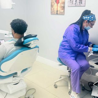 Dentures in Miami FL with dental team preparing patient care at Dental Blush Tamiami