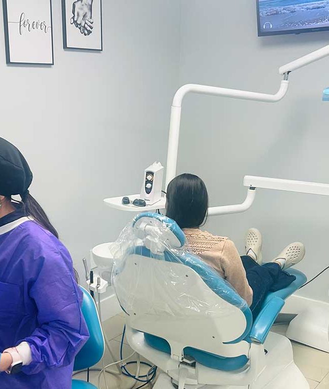 Jessica Morales providing dental hygiene care at Dental Blush