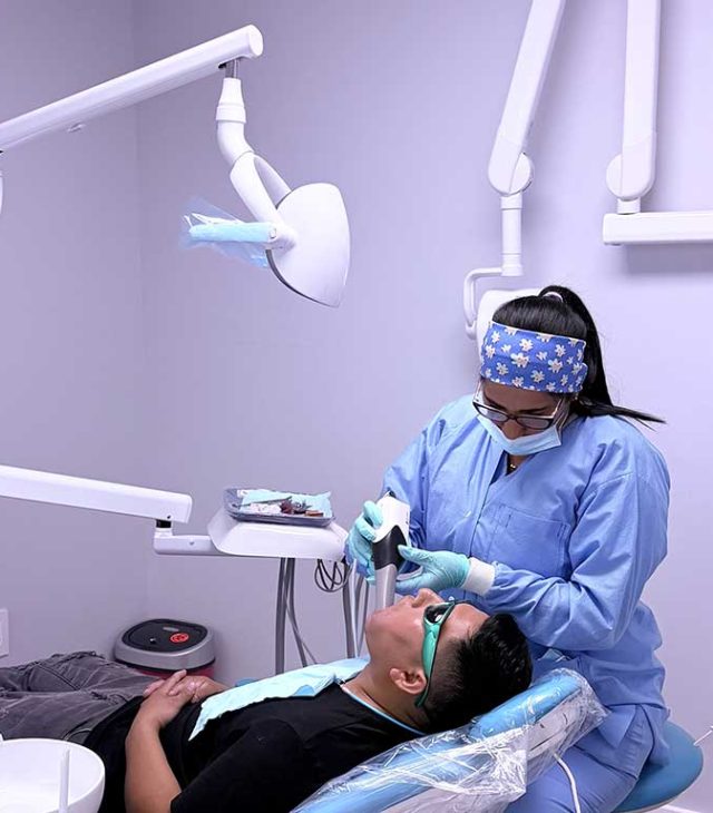 Michel Rojas Millet providing clinical support at Dental Blush