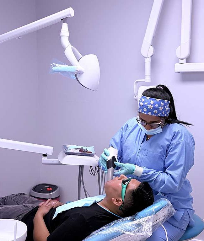 Michel Rojas Millet providing clinical support at Dental Blush